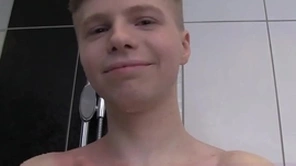 Cute slithery boy alone to a shower