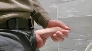 Horny at the mall. masturbating in the public restroom.