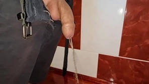 Small uncut cock pissing