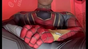 Jakipz strokes his massive cock in super adventuress costumes before serious a huge load